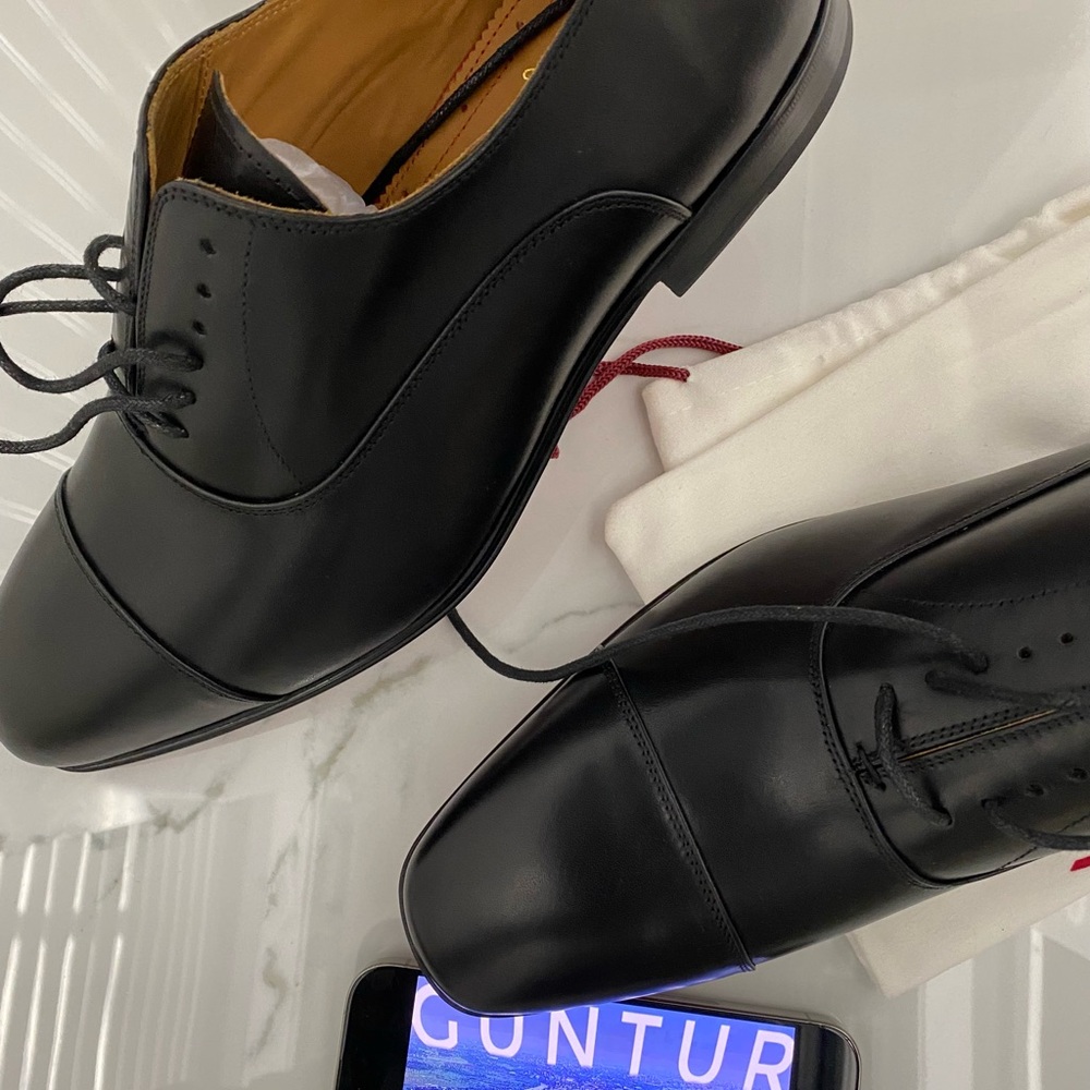 Christian Louboutin Red Bottom Greggo
Lace-up shoes Patinated calf leather Black